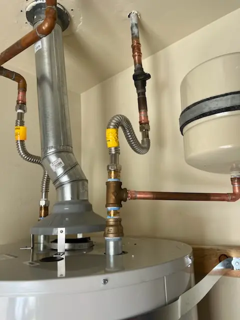 Water heater installation and plumbing repair in Scarff